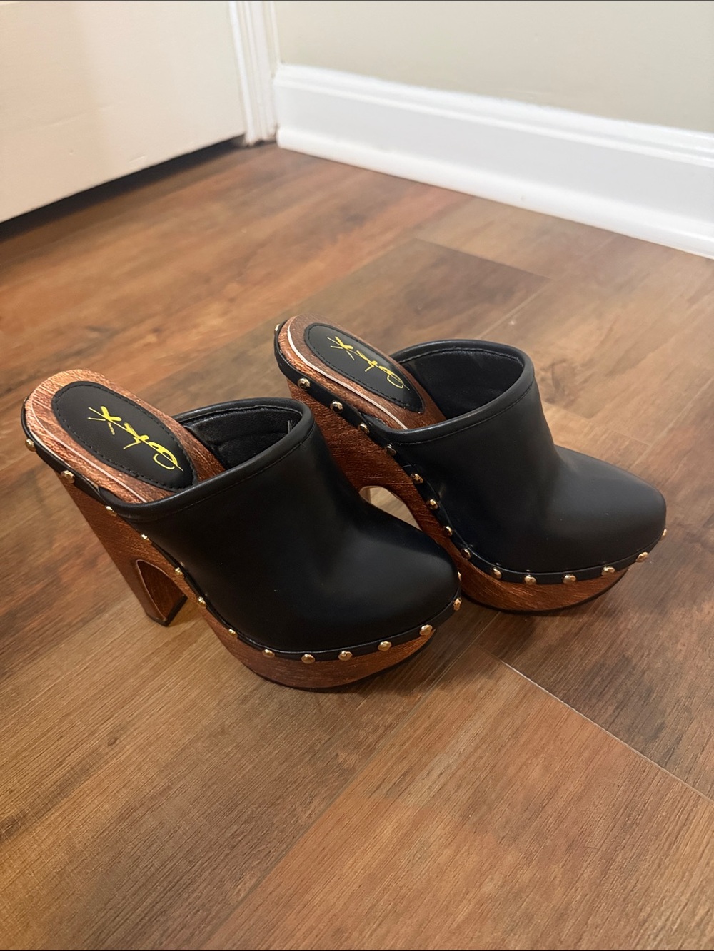 XOXO Black Leather Platform Mule Clogs with Wood Heel